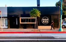 Exterior shot of Soda Bar from El Cajo Blvd