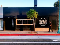 Exterior shot of Soda Bar from El Cajo Blvd