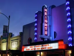 A neon sign on the facade of the venue that reads "Heights"